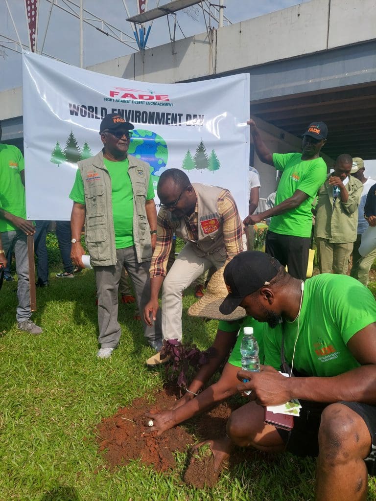 President Arthur Nkemka Rotary Club planting tree.
