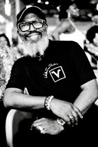 DJBola Browne, Freedom Park’s Director of Progs, buried in colours 40 Raybee